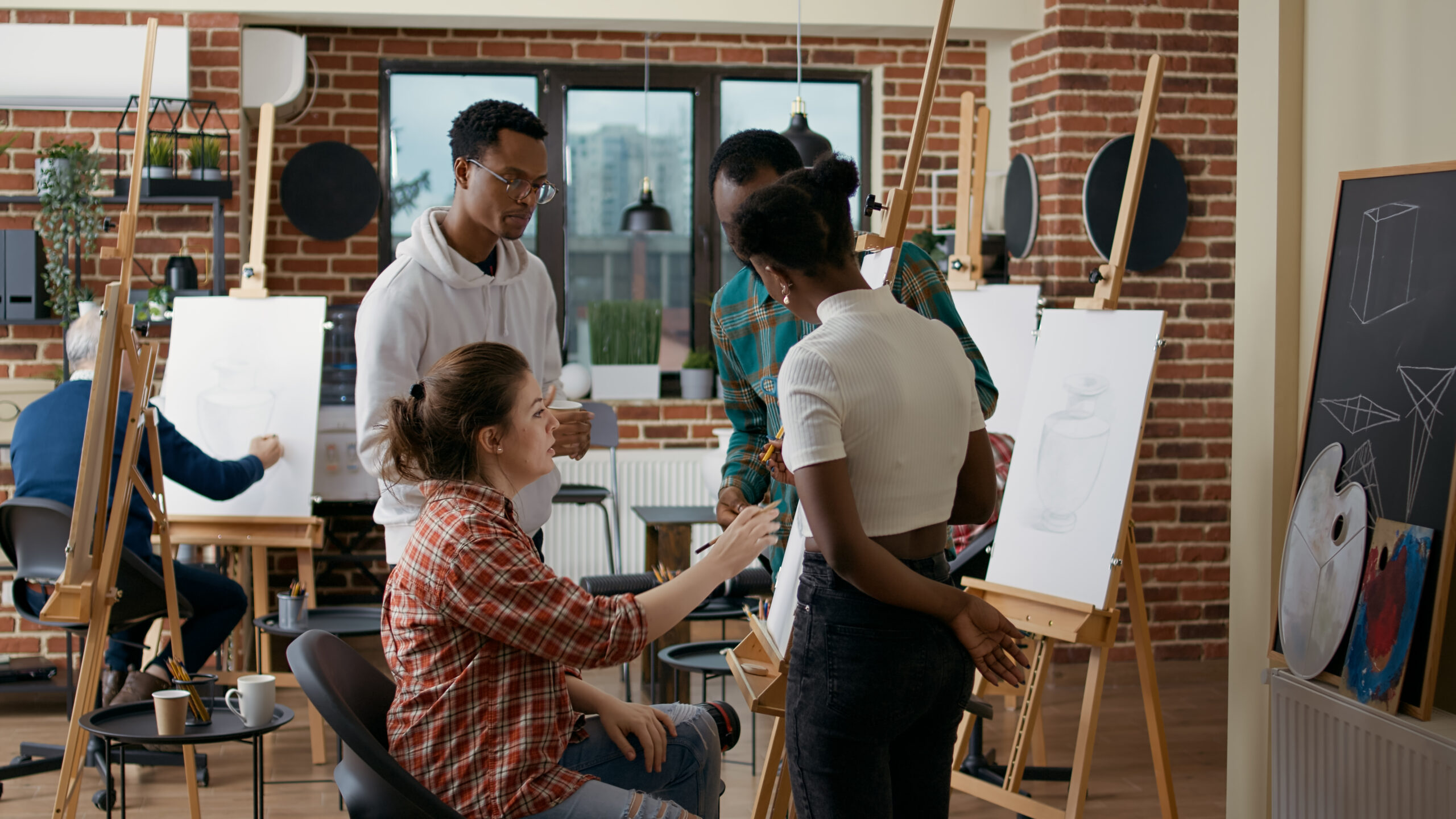Multiethnic group of students learning to draw sketch together in art class, using pencil and canvas to create vase model for personal growth. Workshop for drawing skills development. SSUCv3H4sIAAAAAAAAA01STW/bMAz9K4HOFiDJsizlNgw77rTtVOxAiVQi1LUKW25RBPnvo5N0m04i+cjHj3cRBcVRKD16FVOUOTmUNgUvwxhADr3RJoNXxjrRCYRG4qj7XhmnB28G5QfFrxMR1pLE8SLKNG1rW6CVOosjRxaakZbbl7C0uhSY2Lp2Ym3QtpVWTmMrce0TR2/2Z72ny+7nBr/hlu41OW+L7PmRzrVO3eFrnSY6UXf4NZc3WtbSPg7Ukrh2n7k/z3T4srT1b+r3siaaJpipbut/wL8Acf3dCTjRnD725q77FBPBrdcnQQQhh4jSBW2lBZ9kREgSciRDiSBFw6VGUBSNypJw8NJmEyR4MDKQNhGyc157hukYgsroZHBDlna0UUJvQAIliz3gqLPdV6+zS1YPchi0kRYNwywFqXC0WeuYHaqd1IIJPmipVAJpDdeFnpSESEE7rYIJI8NIDWQGruGQ+ayFIKPnYcbReSYEZ1xmGFhnkCzKMTsmZX4JI9PnHNSYvcOE+6Q0ZpMMaml61owdKEvYdQQhoI6GwGMUvNHn90bLy+PetZ13WfDu6za35eO+/6nWV4gTqyzDtFInzrCuDMCHgxNfl5LKfHqohsVWX+7/ubb9QLcztpqeCz6o7kI7F/buPBexvU4VkPAR3uJLae3TXOit0Ps/9PV6/QNwcTk2JgMAAA==